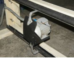 Двигатель имитирующей воздействие массы грузовой двери